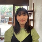 woman with medium length dark hair 